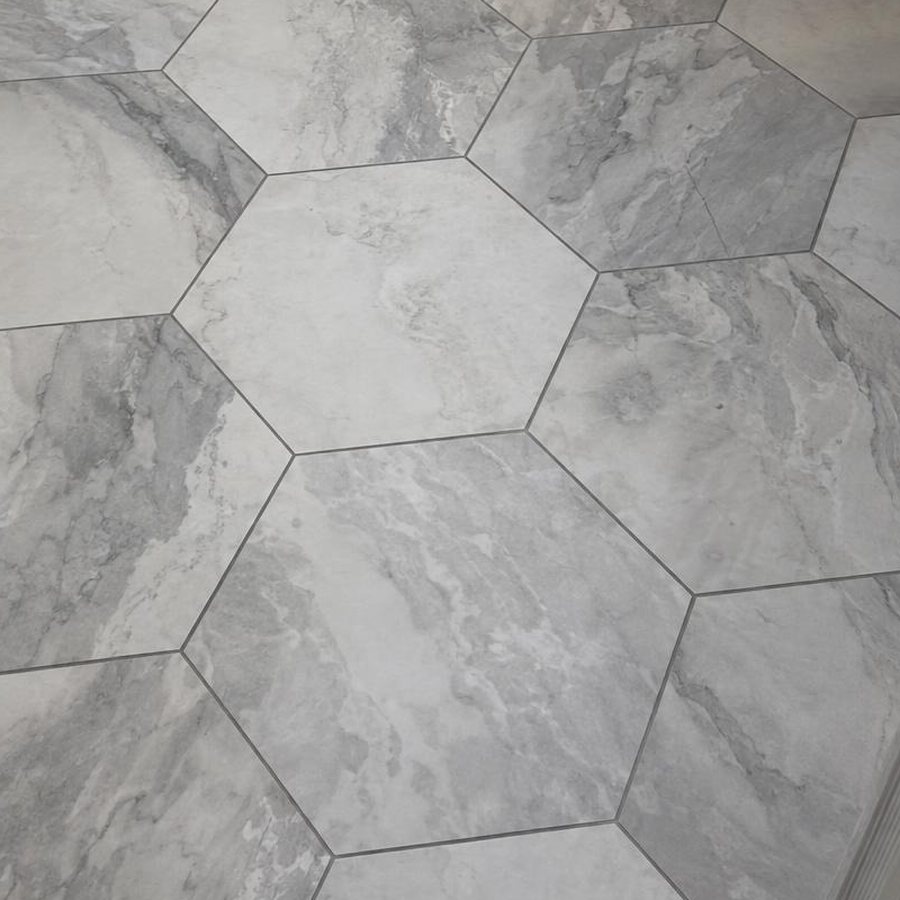 Close-up of large grey and white hexagon floor tile