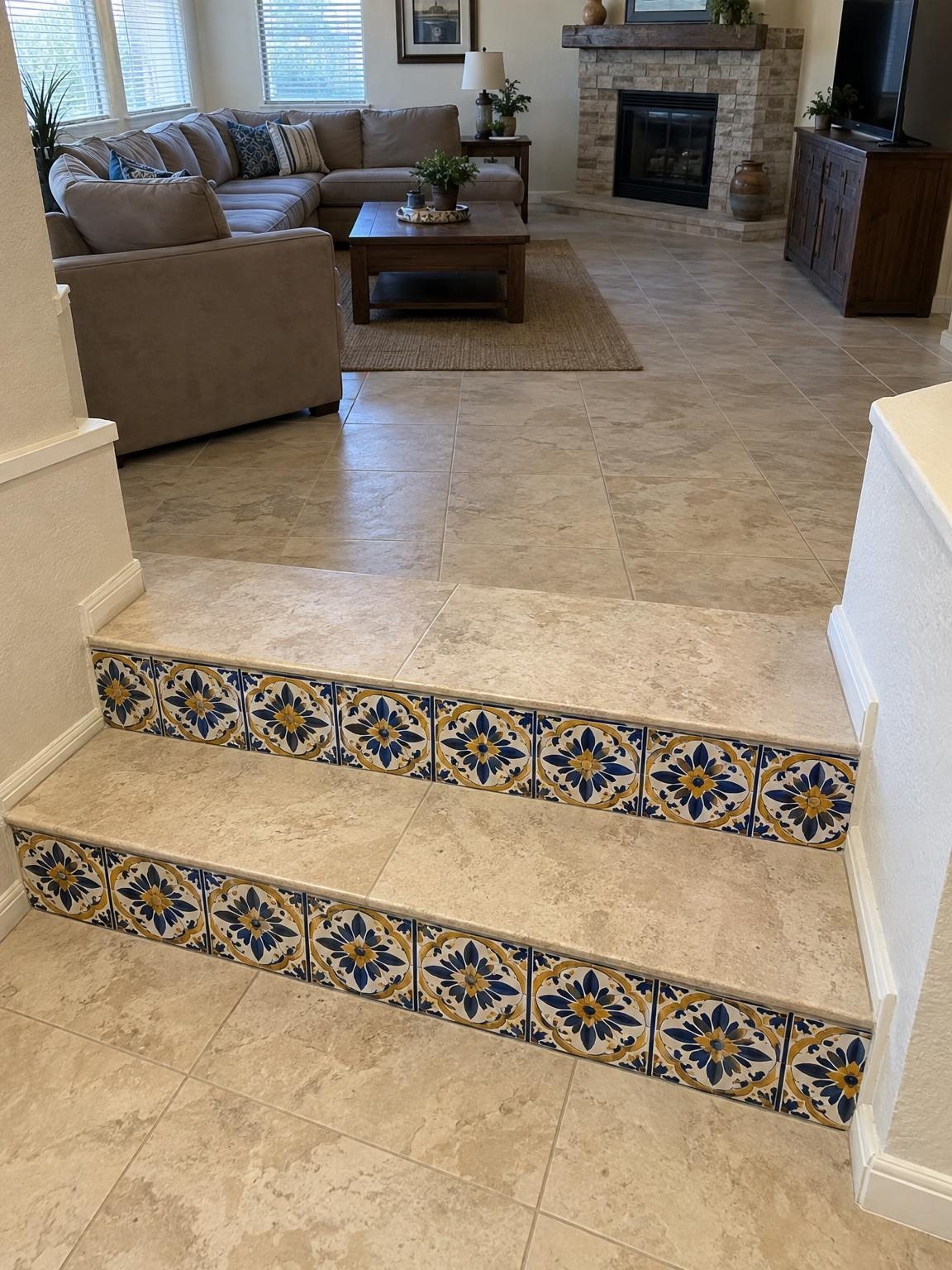 Travertine-look steps with patterned tile risers